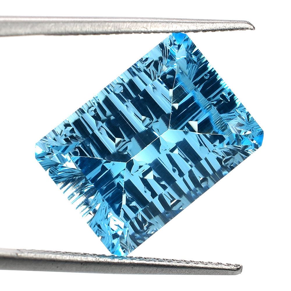SWISS BLUE TOPAZ FANCY CUT OCTAGON (DES#41) CONCAVE SPENDOR CUT (BLUE/CLEAN) 16X12MM 13.60 Cts.